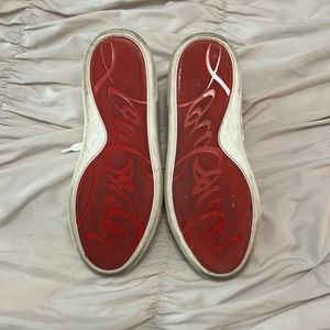 38.5 Christian Louboutin sneakers, snake skin pattern, red rubber sole